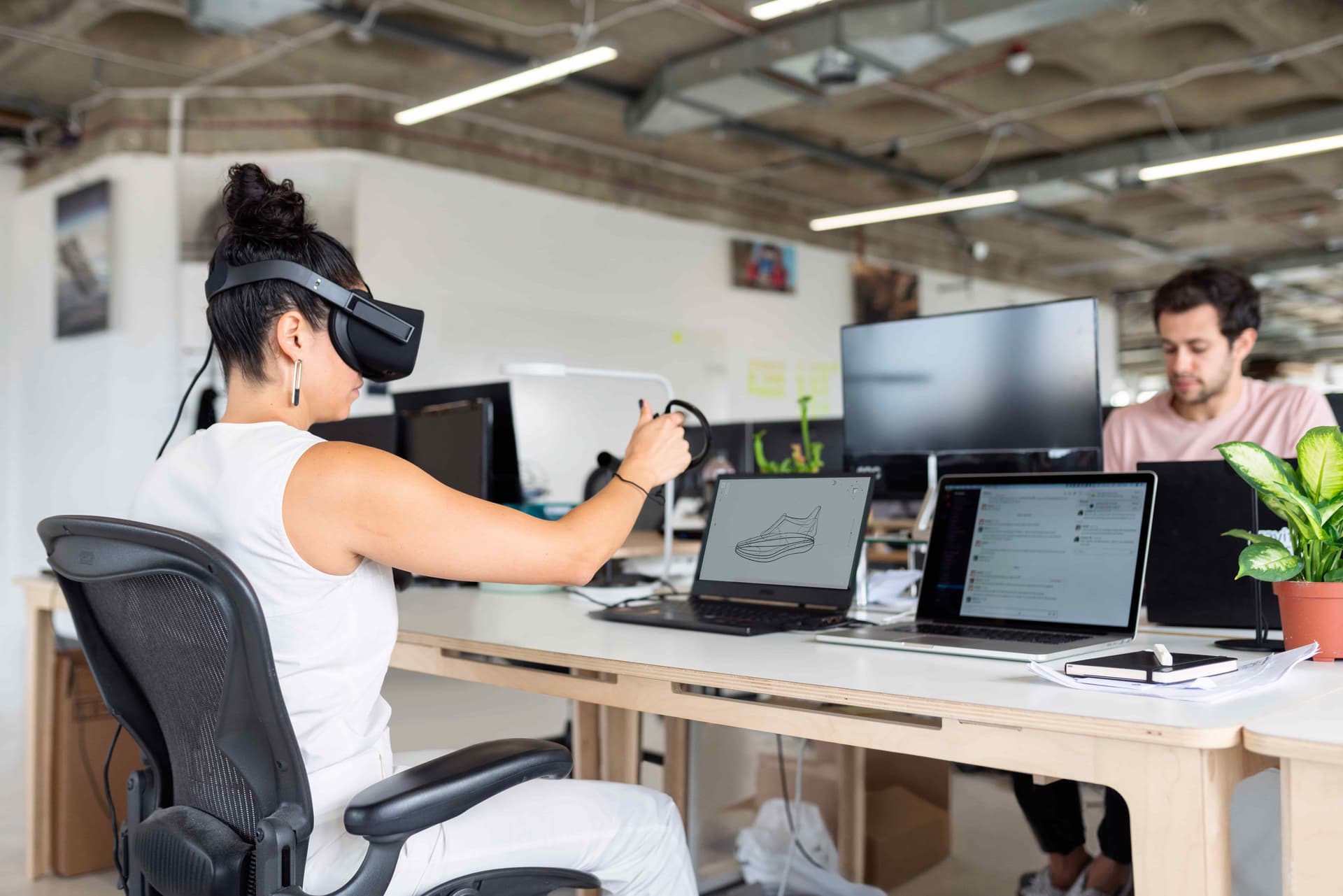 People working in an office while using augmented reality.